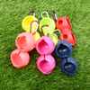 Durable 2-Ball Peanut Shape Silicone Golf Ball Holder, with carabiner clip for easy carrying.