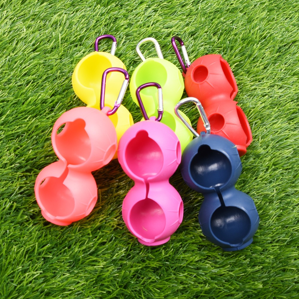 Durable 2-Ball Peanut Shape Silicone Golf Ball Holder, with carabiner clip for easy carrying.
