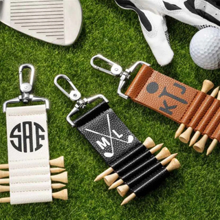 Compact PU Leather Golf Tee Holder with Metal Keychain Clip - Holds 5 Tees, measures 4.5" x 1.5"