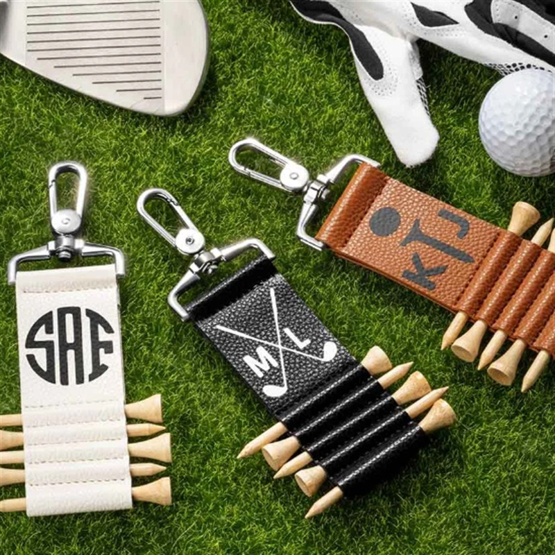 Compact PU Leather Golf Tee Holder with Metal Keychain Clip - Holds 5 Tees, measures 4.5" x 1.5"