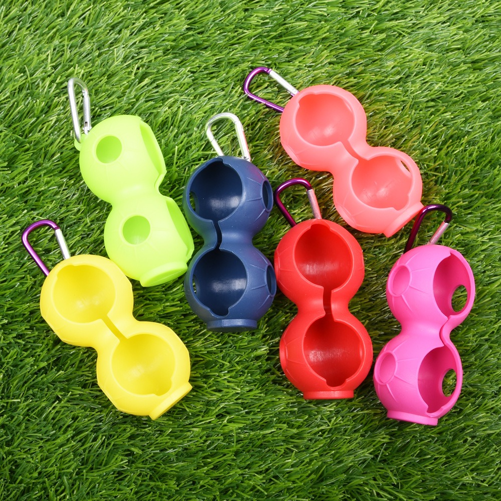 Durable 2-Ball Peanut Shape Silicone Golf Ball Holder, with carabiner clip for easy carrying.