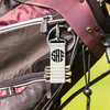 Compact PU Leather Golf Tee Holder with Metal Keychain Clip - Holds 5 Tees, measures 4.5" x 1.5"